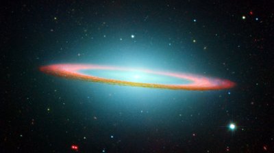 Part of the Sombrero Galaxy in infrared showing floating ring by National Aeronautics and Space Administration National Aeronautics and Space Administration